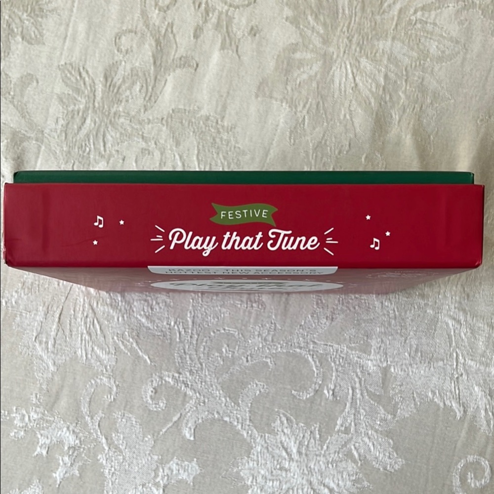Demdaco Festive Play That Tune Activity Kazoo Game - Red and White - Picture 3 of 5